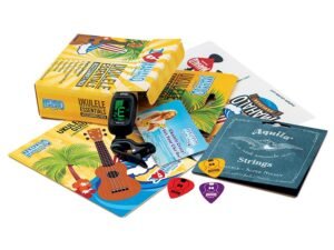 essentials pack, clip-on tuner, Aquila strings, picks, guide book, stickers, e-book